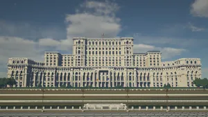 Romanian Parliament Buildings Silhouetted Against A Dark Sky Wallpaper