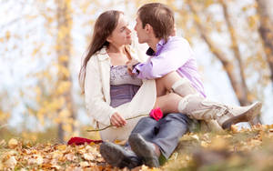 Romantic Couples During Fall Season Wallpaper