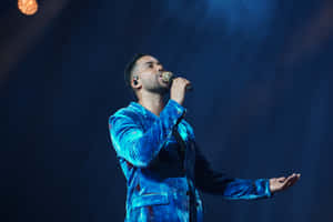 Romeo Santos Live Performance Blue Velvet Wallpaper