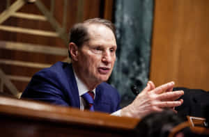 Ron Wyden Speaking With Hand Gestures Wallpaper