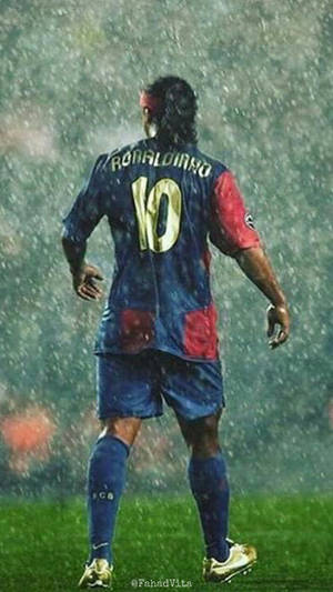 Ronaldinho In Action During The Football Match Wallpaper