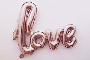 Rose Gold Inflated Text Laptop Wallpaper