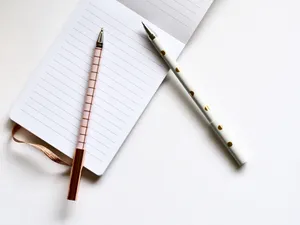 Rose Gold Pens On Notebook Wallpaper