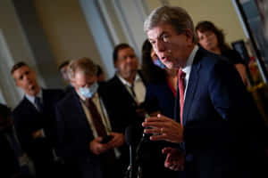 Roy Blunt Surrounded By People Wallpaper