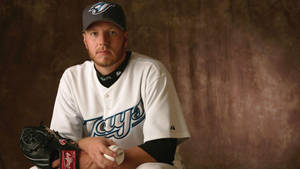 Roy Halladay Posing With Baseball Wallpaper