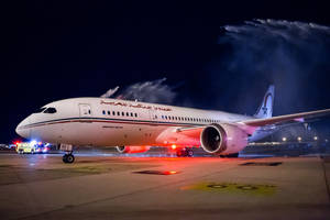 Royal Air Maroc Plane With Splashing Water Wallpaper