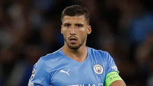 Ruben Dias In Blue Jersey Wallpaper