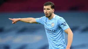 Ruben Dias Pointing In Something Wallpaper