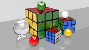 Rubiks Cubeand Reflective Spheres Wallpaper