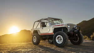 Rugged Adventure Awaits On A Vintage Jeep Cj Wallpaper