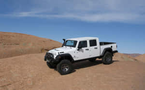 Rugged And Stylish Jeep Gladiator On A Forest Adventure Wallpaper