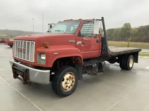 Rugged Gmc Topkick On A Scenic Country Road Wallpaper