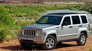 Rugged Jeep Liberty Conquering The Off-road Terrain Wallpaper