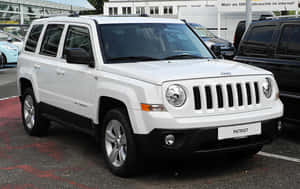 Rugged Jeep Patriot Conquers The Off-road Terrain Wallpaper