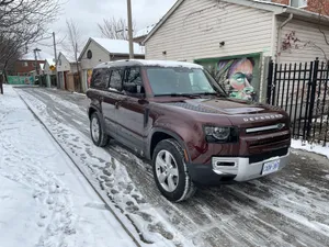Rugged Land Rover Defender On Off-road Adventure Wallpaper