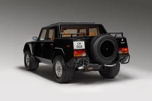Rugged Luxury - Lamborghini Lm002 In Its Mesmerizing Habitat Wallpaper