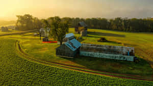 Rural Farmland With Barns Wallpaper