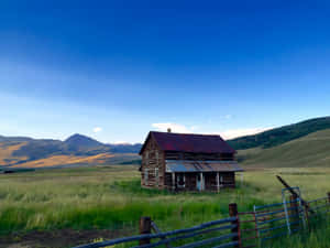 Rustic Log Cabinin Mountain Valley Wallpaper