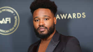 Ryan Coogler At A Speaking Engagement Wallpaper