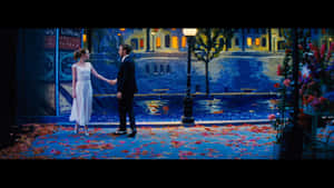 Ryan Gosling And Emma Stone Dancing In La La Land Wallpaper