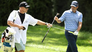 Ryan Palmer Exchanging Golf Clubs Wallpaper