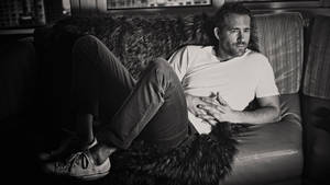 Ryan Reynolds On Sofa Monochrome Wallpaper