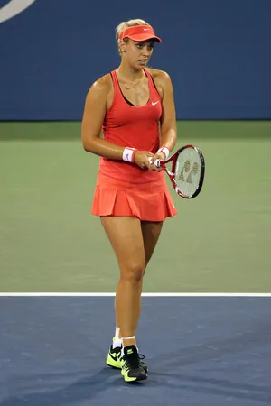 Sabine Lisicki Holding Racket Wallpaper