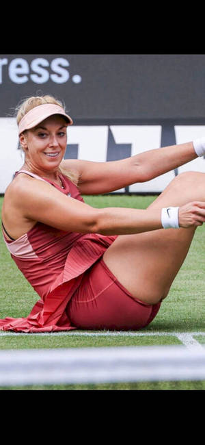 Sabine Lisicki Sitting On Court Wallpaper