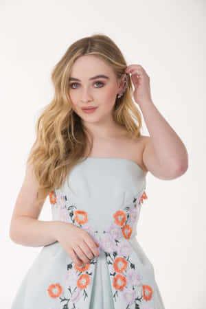 Sabrina Carpenter Floral Dress Portrait Wallpaper