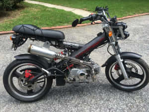 Sachs Mad Ass Motorcycle Parked Wallpaper