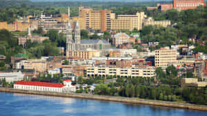 Saguenay Cityscape Overlooking Water Wallpaper