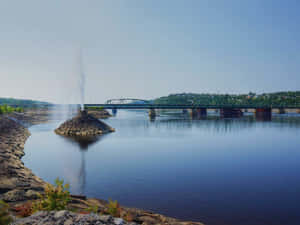 Saguenay River Fountainand Bridge Wallpaper