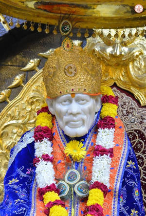 Sai Baba Saint Statue Dressed In Blue 4k Wallpaper