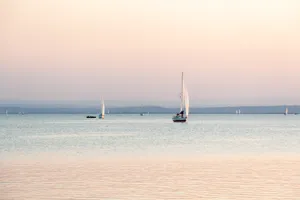 Sailboats On Austria Beach Wallpaper