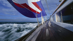 Sailing Fast On Bubbly Waters Wallpaper