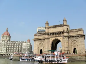 Sailing Past Gateway To India Wallpaper