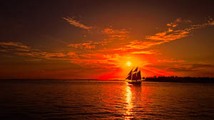 Sailing Ship At Sunset Wallpaper