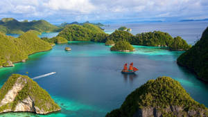 Sailing Ship In Piaynemo Raja Ampat Wallpaper