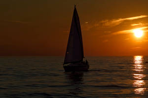 Sailing To Admire Sun Setting Wallpaper