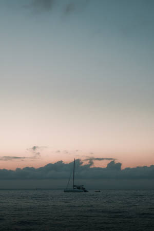 Sailing Under Pastel Twilight Wallpaper