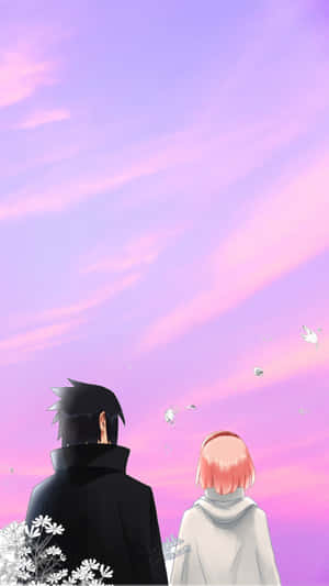 Sakura And Sasuke: Two Of The Legedary Finalists Of The Chunin Exams Wallpaper