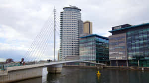 Salford Quays Suspension Bridgeand Buildings Wallpaper