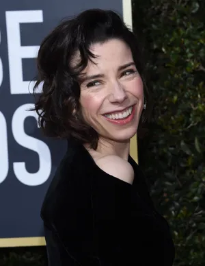 Sally Hawkins Smiling Radiantly At An Event Wallpaper