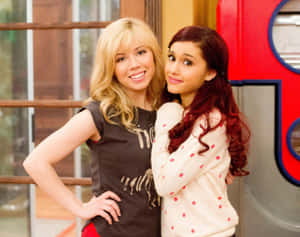 Sam And Cat Embracing As Best Friends Wallpaper