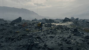 Sam In Rocky Terrain Death Stranding 4k Wallpaper