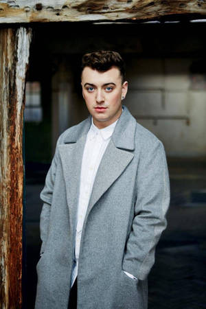 Sam Smith In Grey Coat Wallpaper