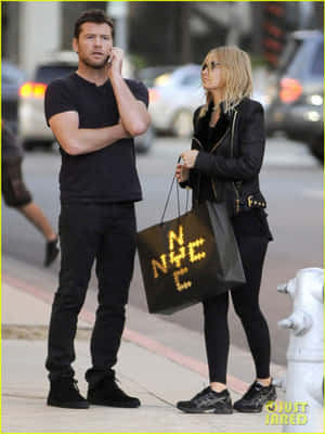 Sam Worthington Lara Worthington Paparazzi Photo Wallpaper