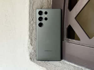 Samsung S23 Ultra Against Wall Wallpaper