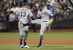 San Diego Padres Slugger Fernando Tatis Jr Showing Off His Athleticism Wallpaper