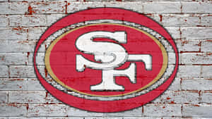 San Francisco 49ers Logo On Brick Wall Wallpaper